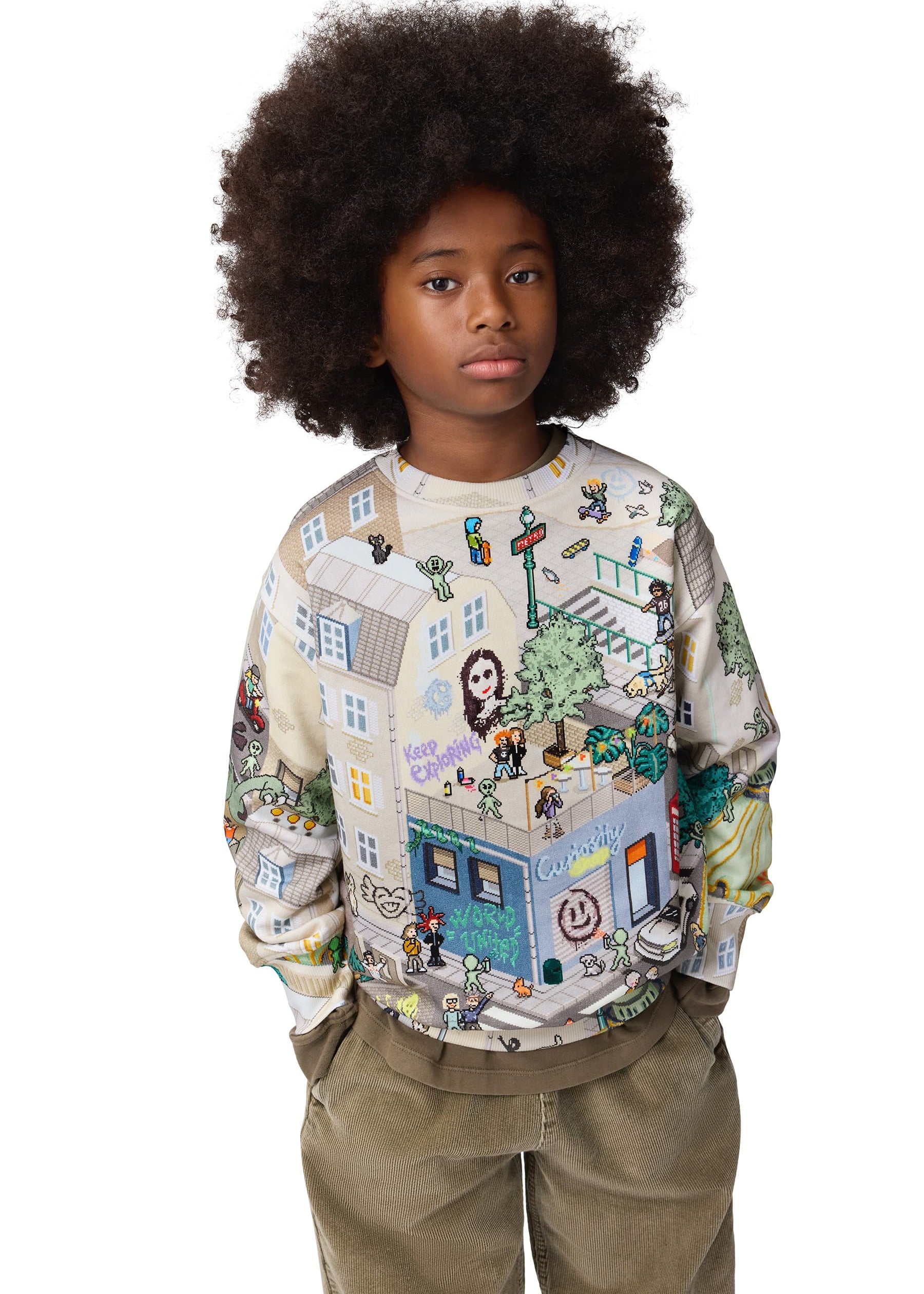 Child wearing a colorful patterned sweatshirt on a white background