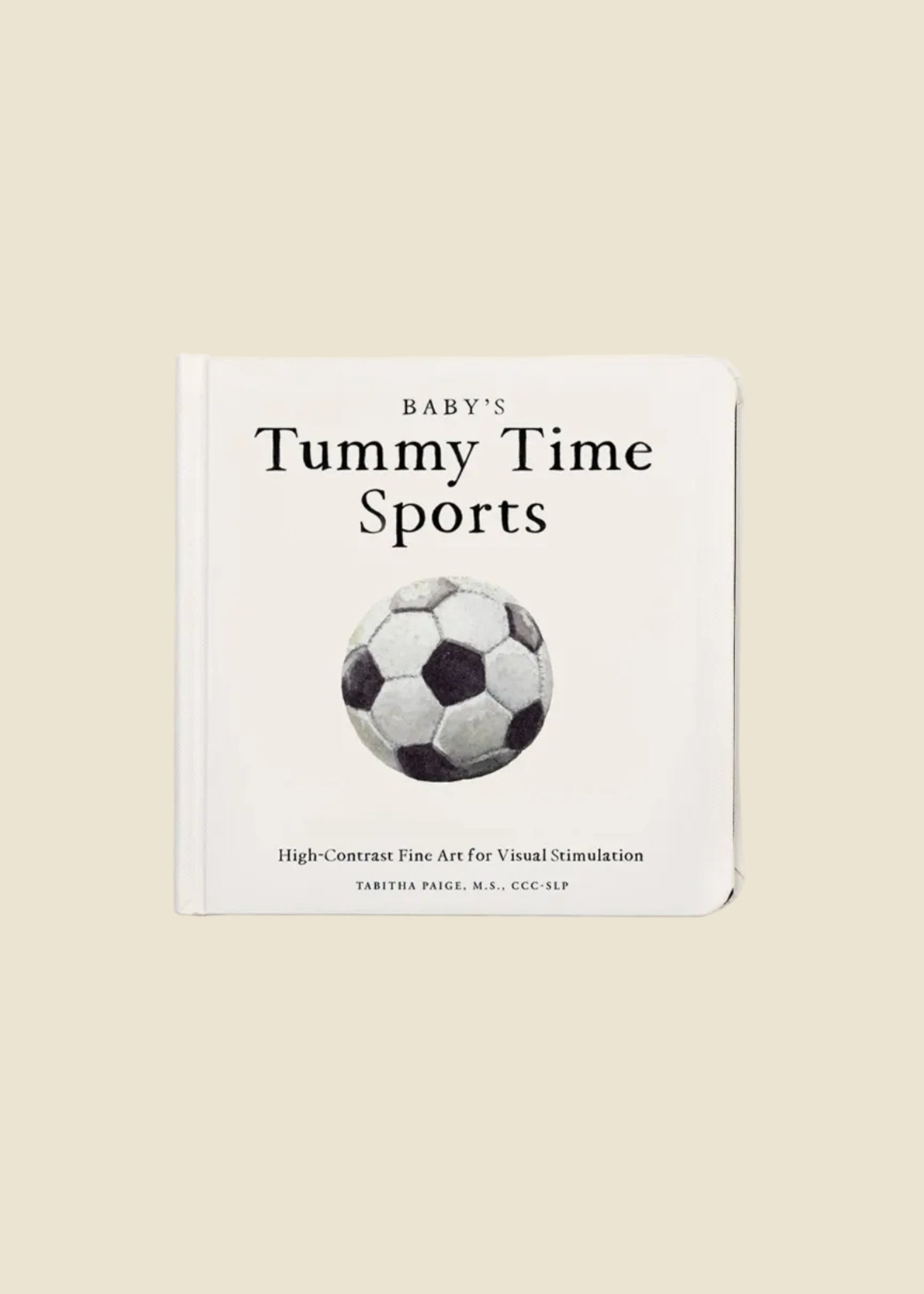 Baby's Tummy Time Sports baby board book with a white cover, black text, and a black and white soccer ball illustration, set against a solid beige background.