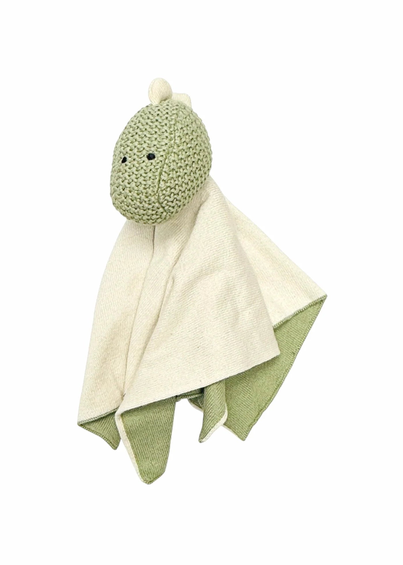 Green plush toy with a white blanket on a white background