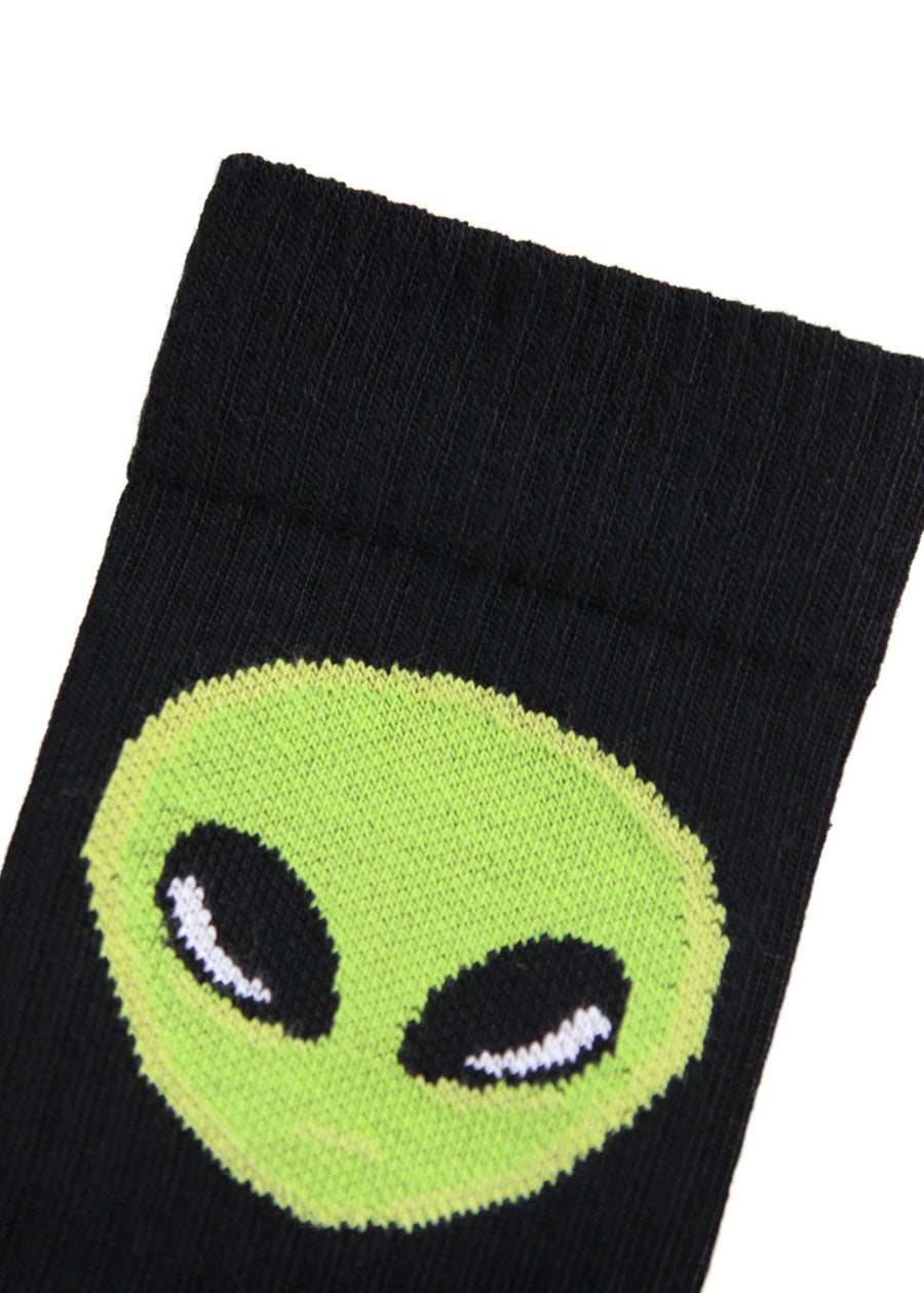 Black sock with a green alien face design on a white background