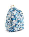 Blue and white floral patterned backpack on a white background