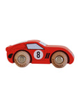 Red wooden toy car with the number 8 on a beige background