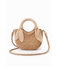 Woven handbag with circular handle and strap on a white background