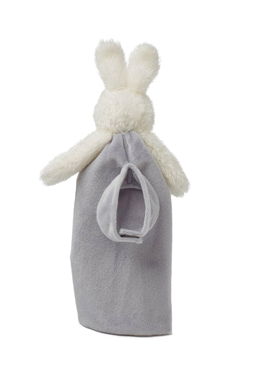 White plush bunny toy wrapped in a gray blanket on a white background