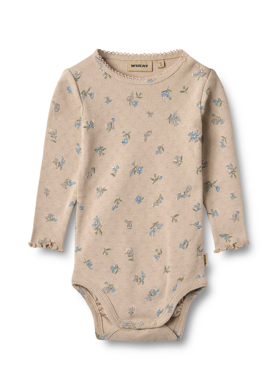 REGITZE FLOWERS LS ONESIE