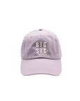 Lavender cap with 'BIG SIS' text on a white background