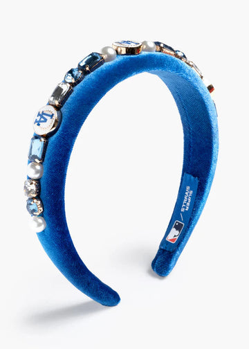 Blue headband with decorative elements on a white background