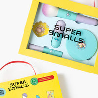 Super Smalls makeup set with yellow packaging on a white background