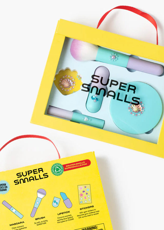 Super Smalls makeup set with yellow packaging on a white background