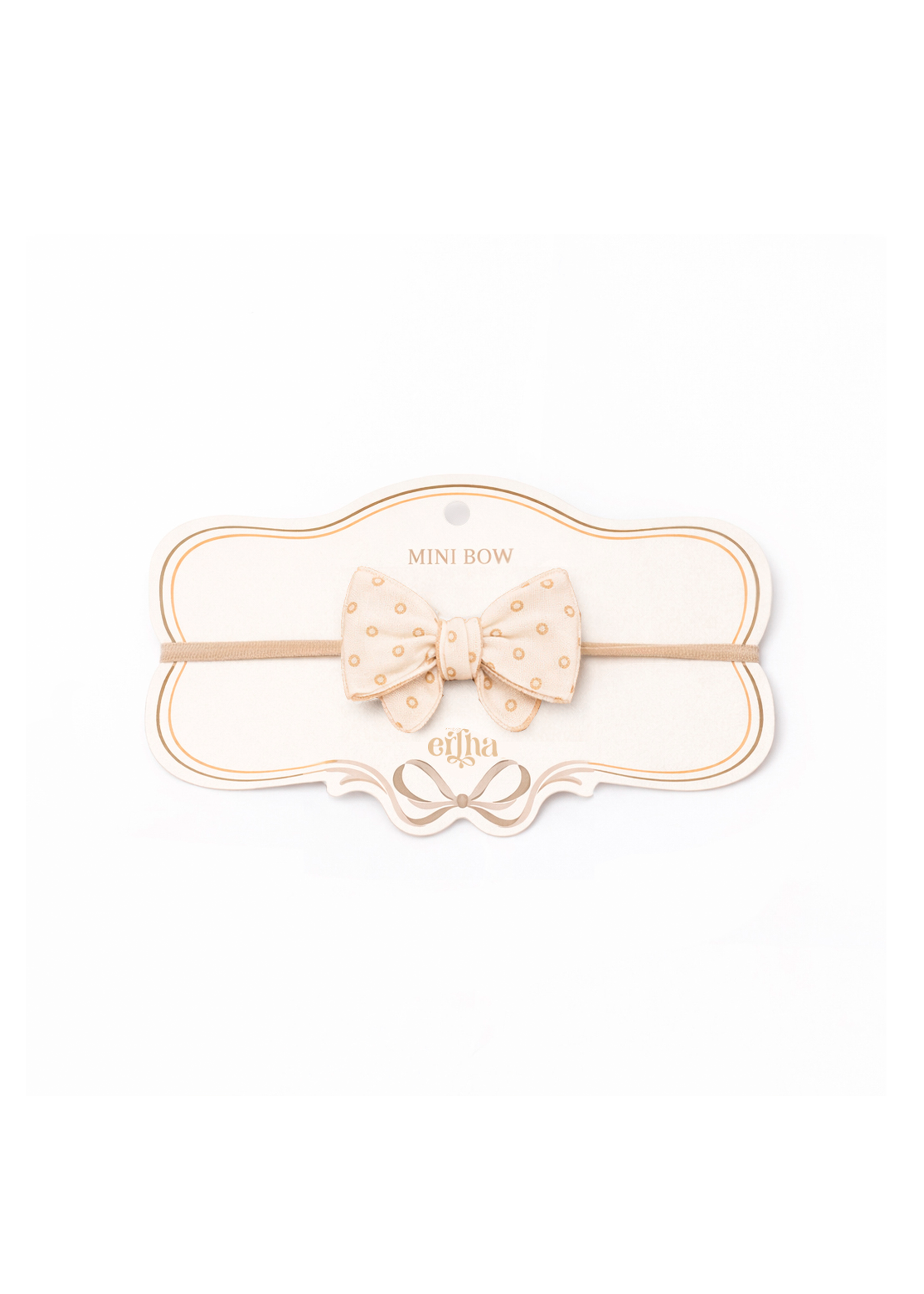 Baby headband with bow on a white background