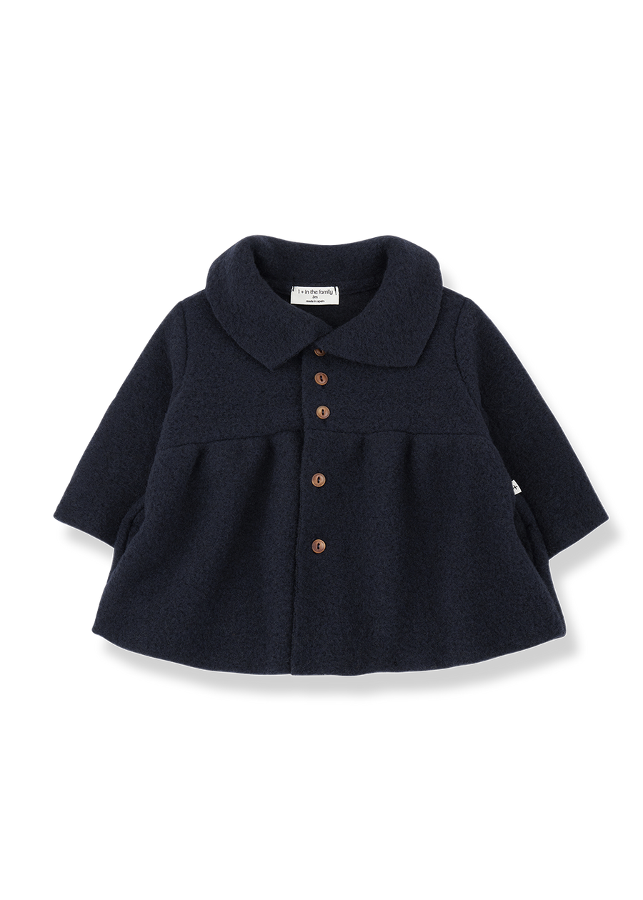 Navy blue coat with brown buttons on a white background