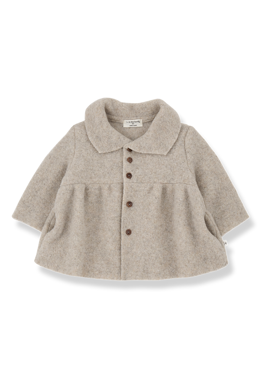 Beige baby coat with buttons on a white background