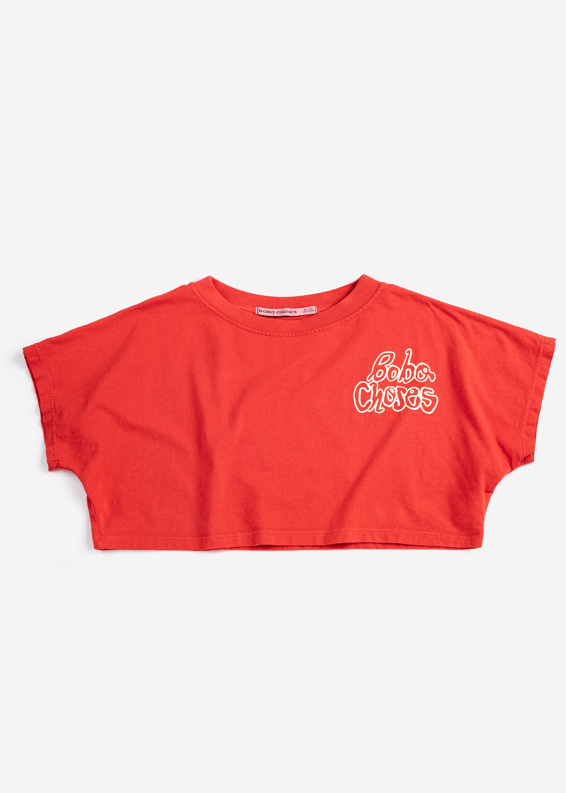 Red crop top with 'Babe Chess' text on a white background