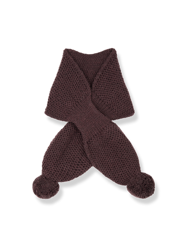 Brown knitted scarf with pom-poms on a white background