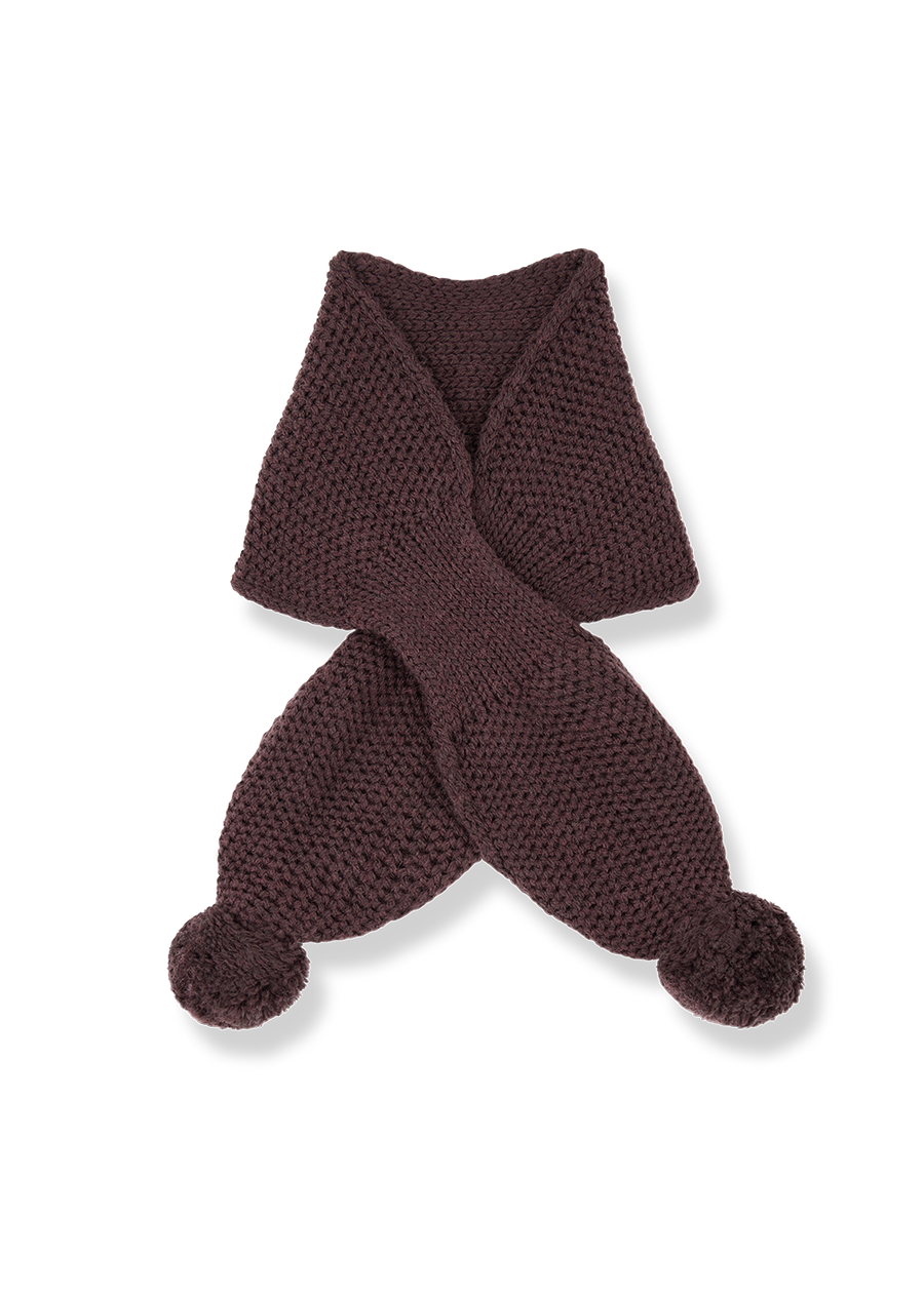 Brown knitted scarf with pom-poms on a white background