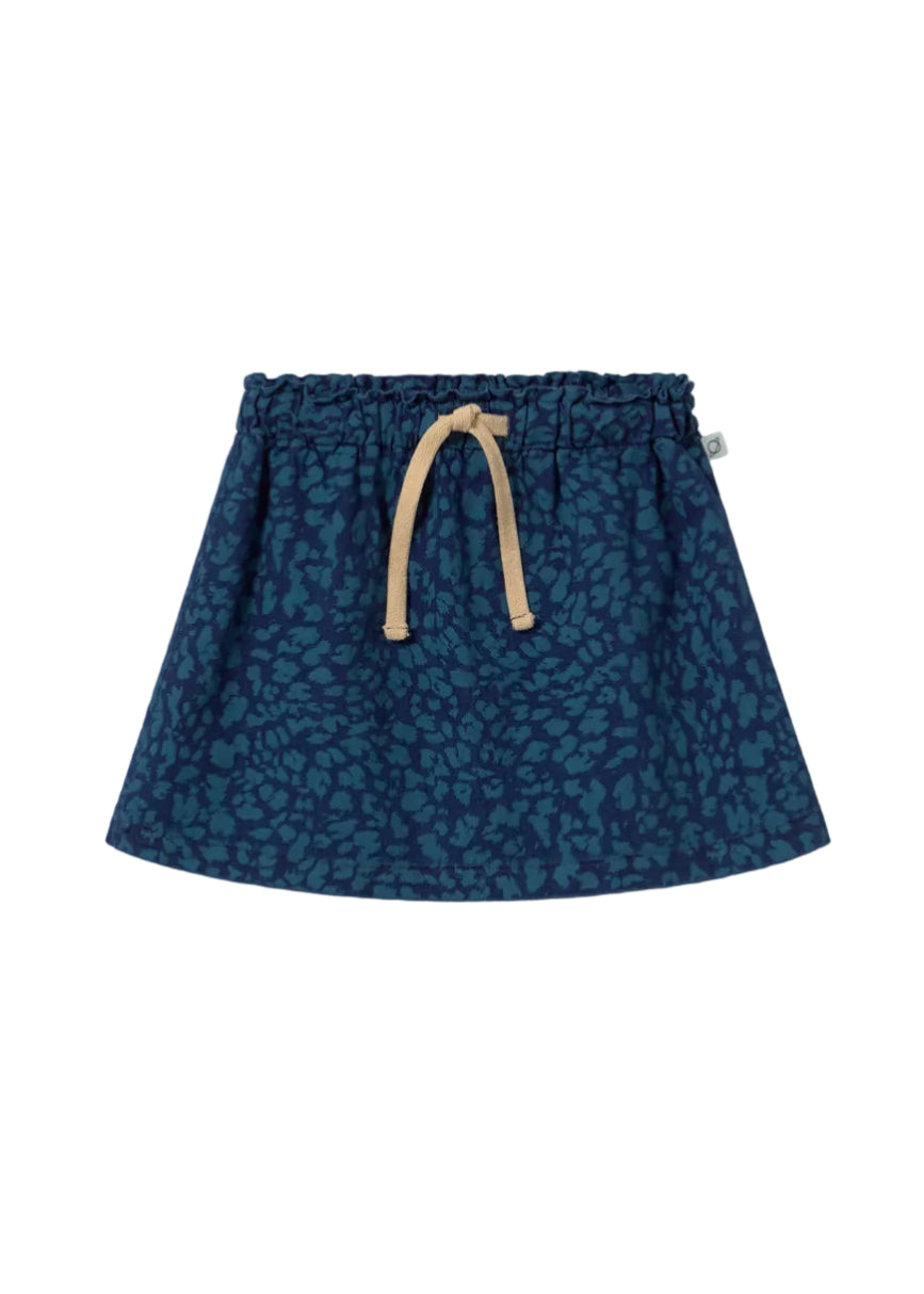 Blue patterned skirt with a drawstring on a light gray background