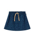 Blue patterned skirt with a drawstring on a light gray background