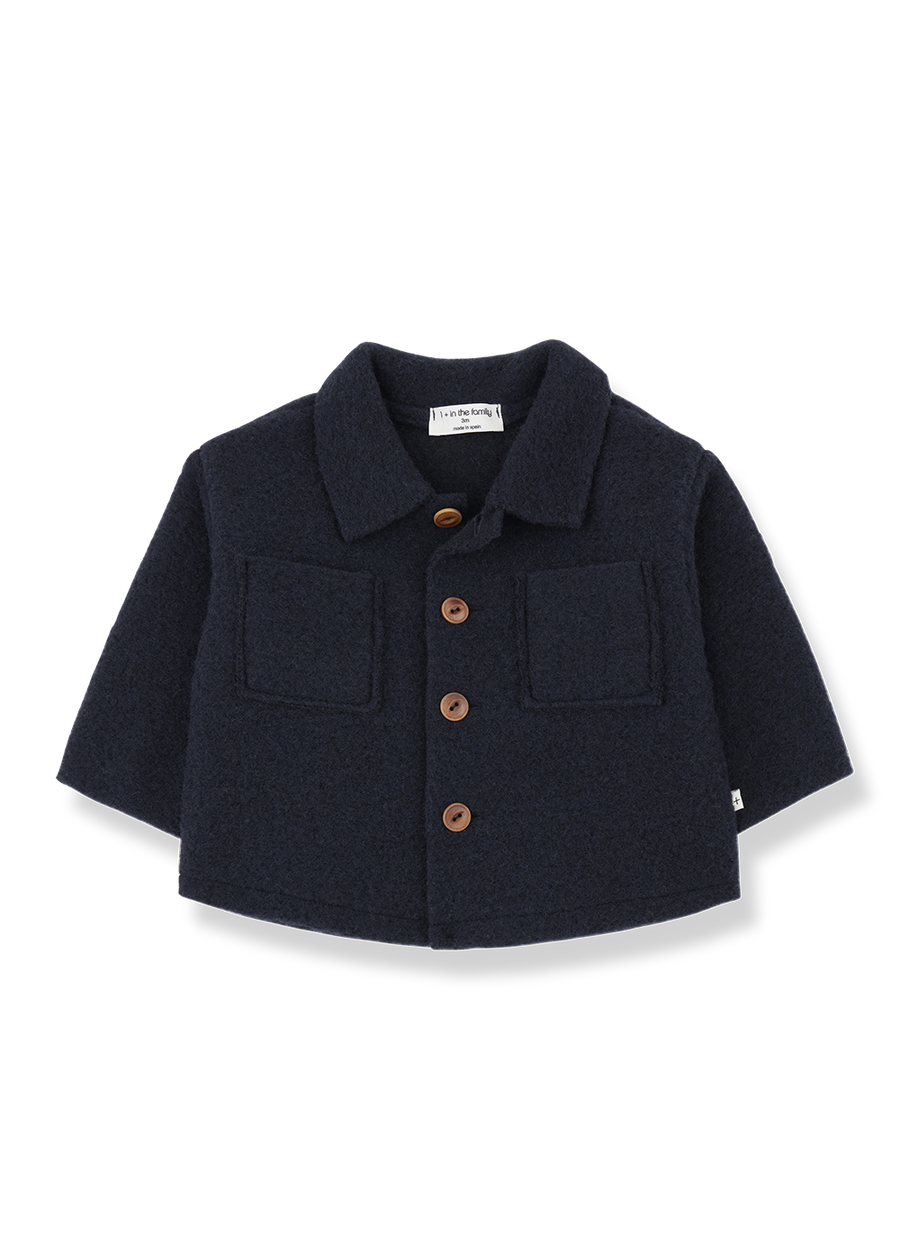 Navy blue children's jacket with brown buttons on a white background