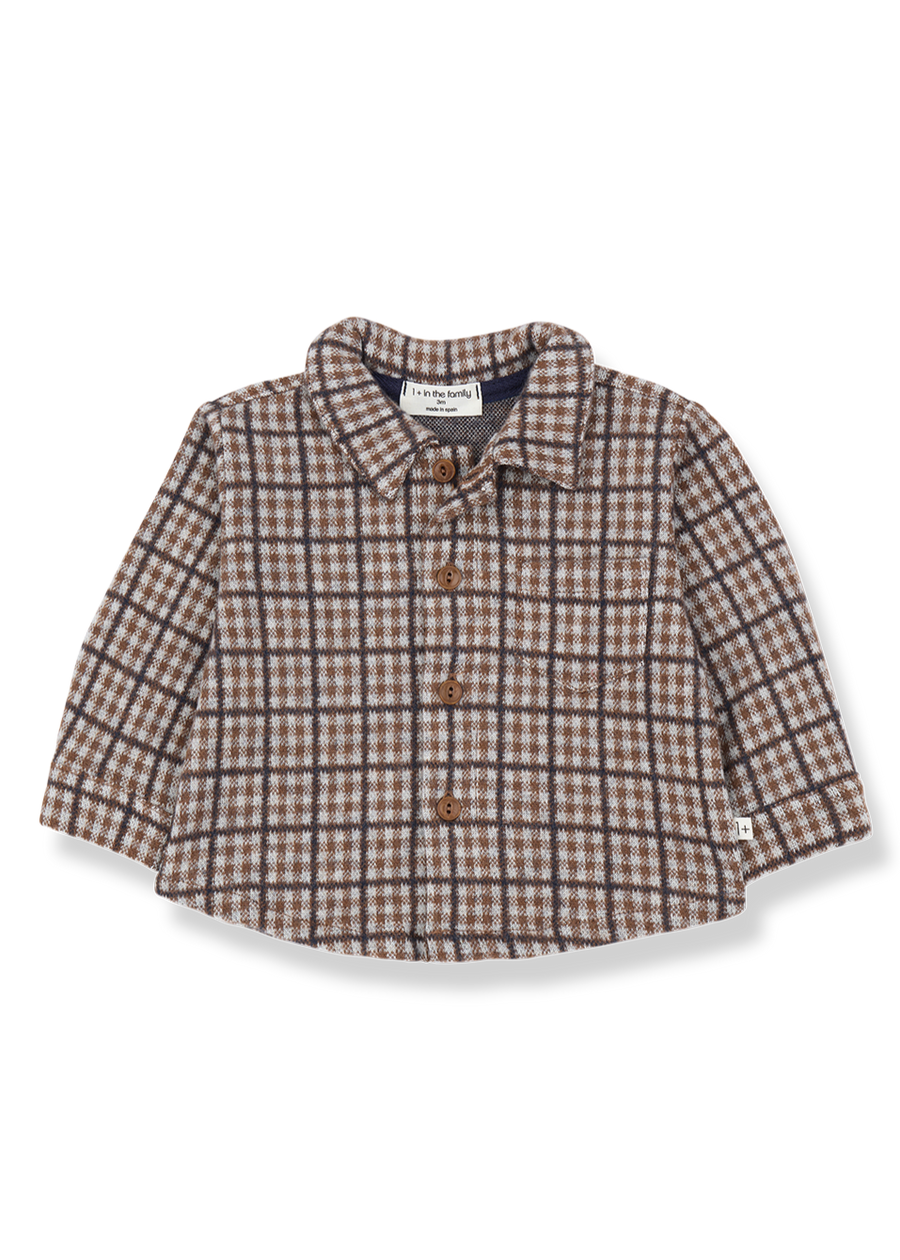 Plaid shirt with buttons on a white background