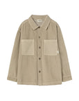 A beige corduroy button-up shirt jacket with a pointed collar, two large front patch pockets, and dark buttons, shown flat on a light gray background.
