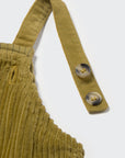 Green corduroy overalls with a strap and buttons on a white background