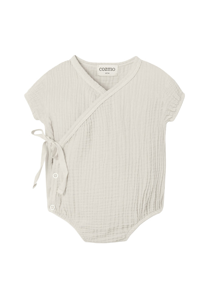 Baby romper with wrap design on a white background, branded 'cozmo'.