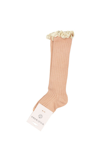 Beige knee-high sock with floral top on a white background
