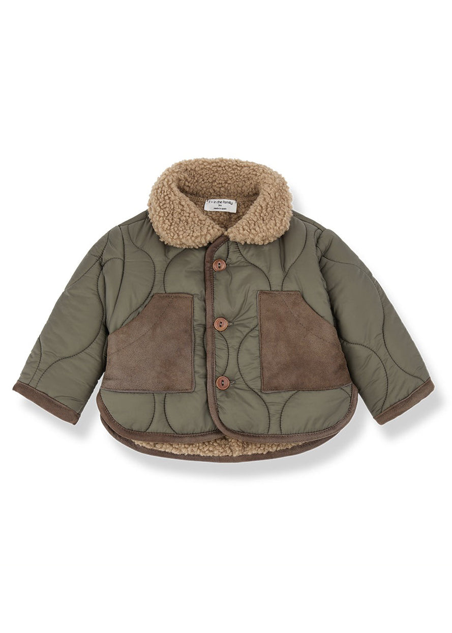 A children's quilted jacket in olive green with brown suede-like front pockets, a brown faux-fur collar, and brown buttons, shown on a plain white background.