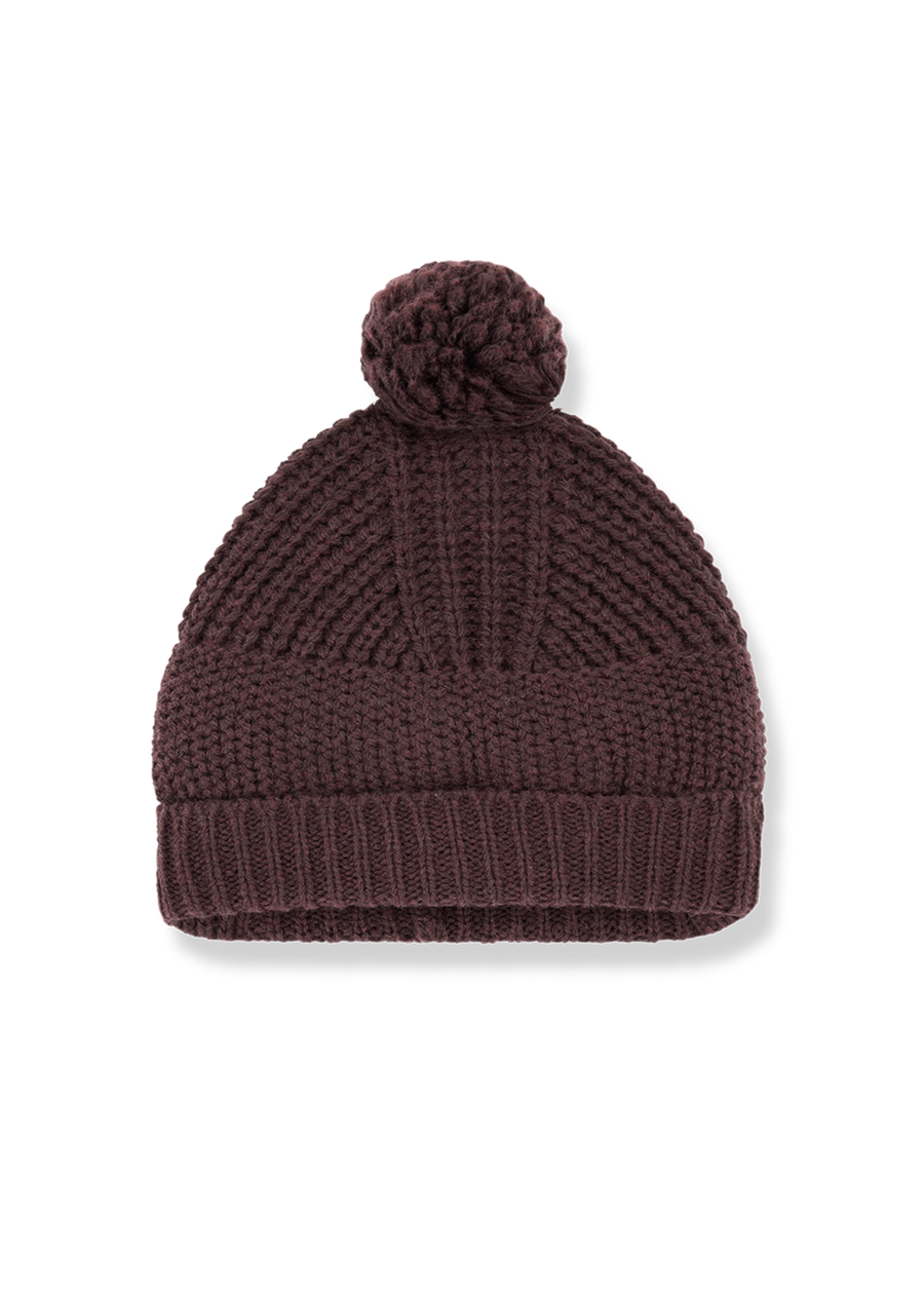 Brown knit beanie with a pom-pom on a white background