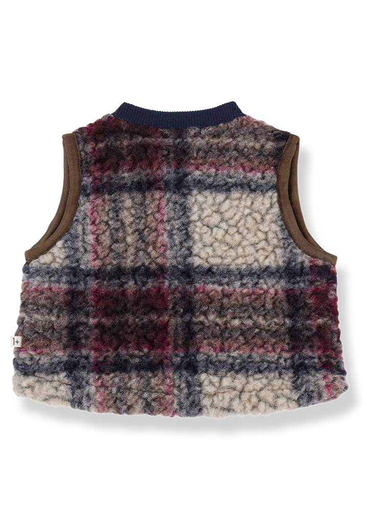 Plaid patterned vest on a white background