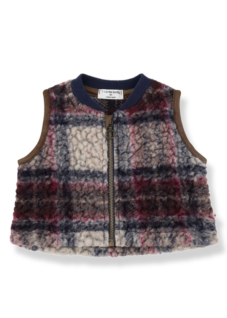 Plaid patterned vest on a white background
