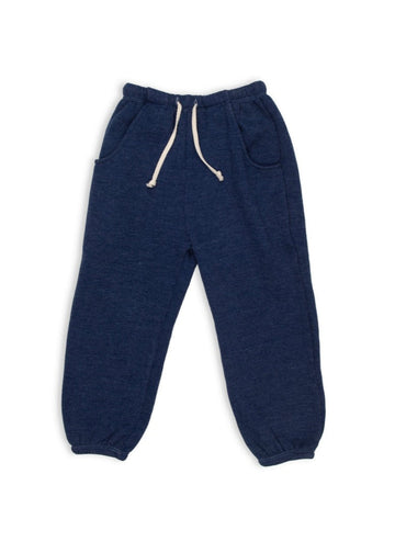 Navy blue jogger pants with a white drawstring on a white background