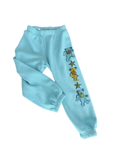 Light blue sweatpants featuring a vertical graphic print of three Grateful Dead-style dancing bears and stars on the left leg, shown against a plain white background.