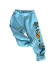 Light blue sweatpants featuring embroidered Grateful Dead-style bears and stars down one leg, shown on a plain white background.