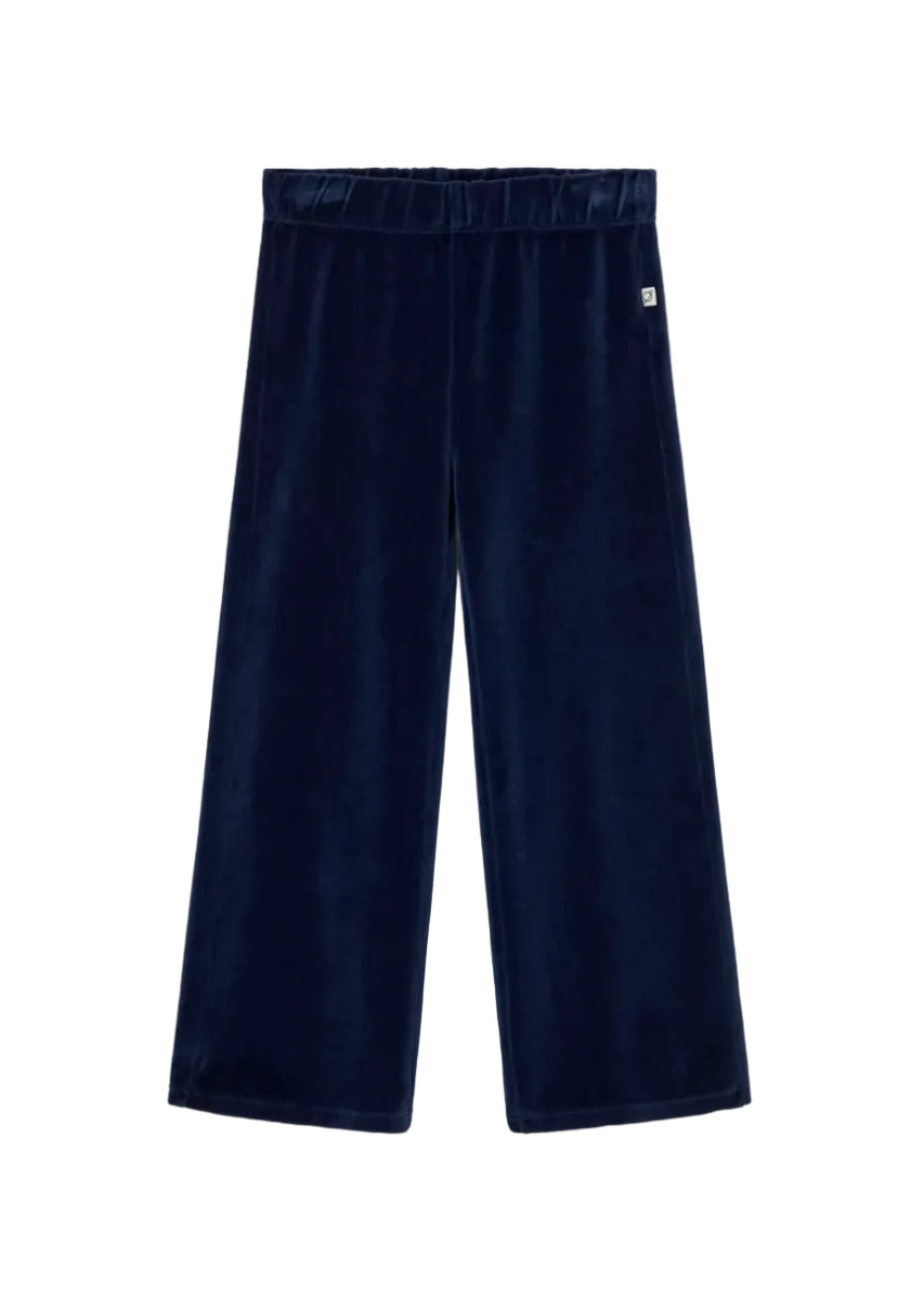 A pair of dark navy blue velvet wide-leg pants with an elastic waistband, shown flat against a light gray background.
