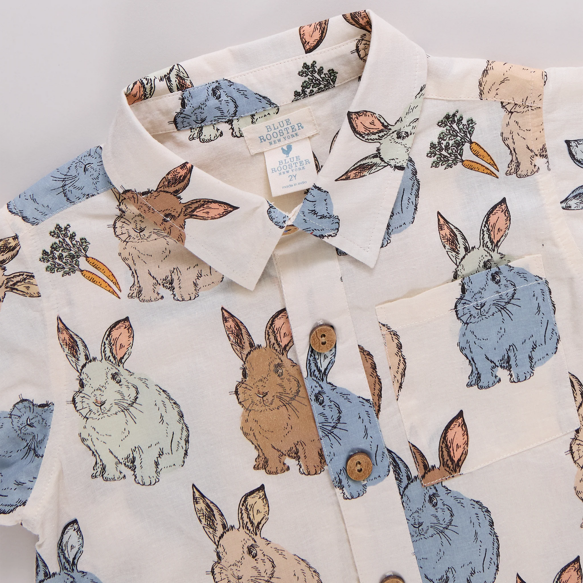 Fabric with rabbit illustrations on a light background