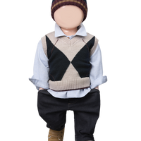 Child's outfit with a sweater vest, shirt, pants, and hat on a white background