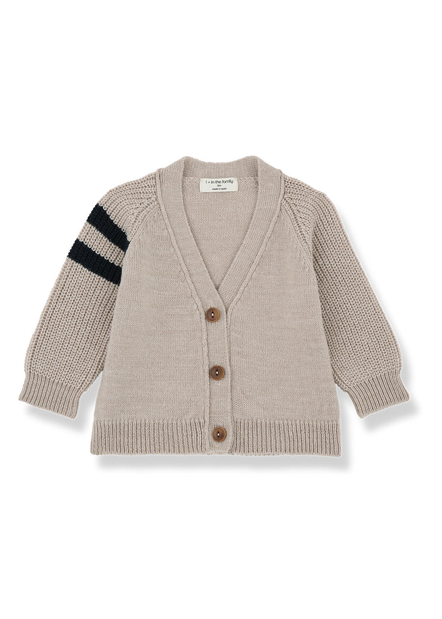 Beige baby cardigan with brown buttons and black stripe on a white background