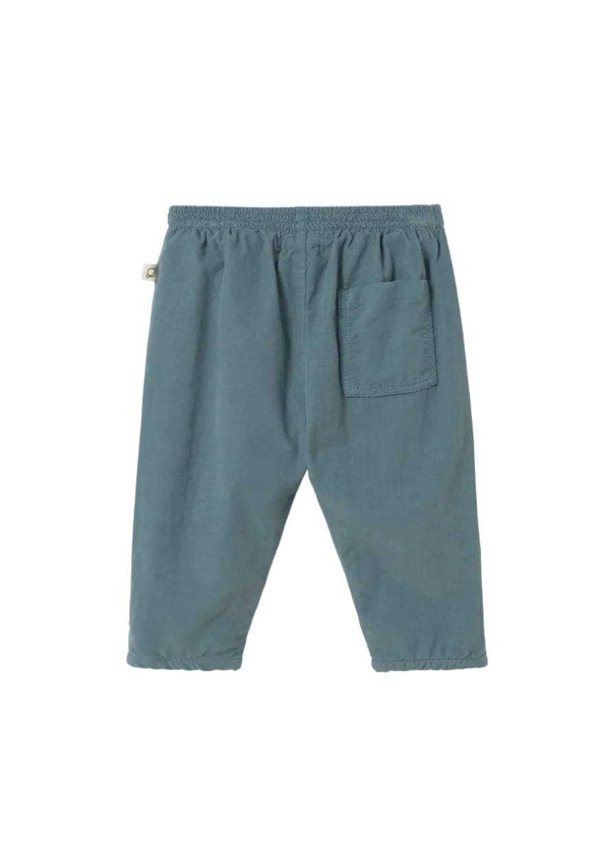 Blue pants on a light gray background