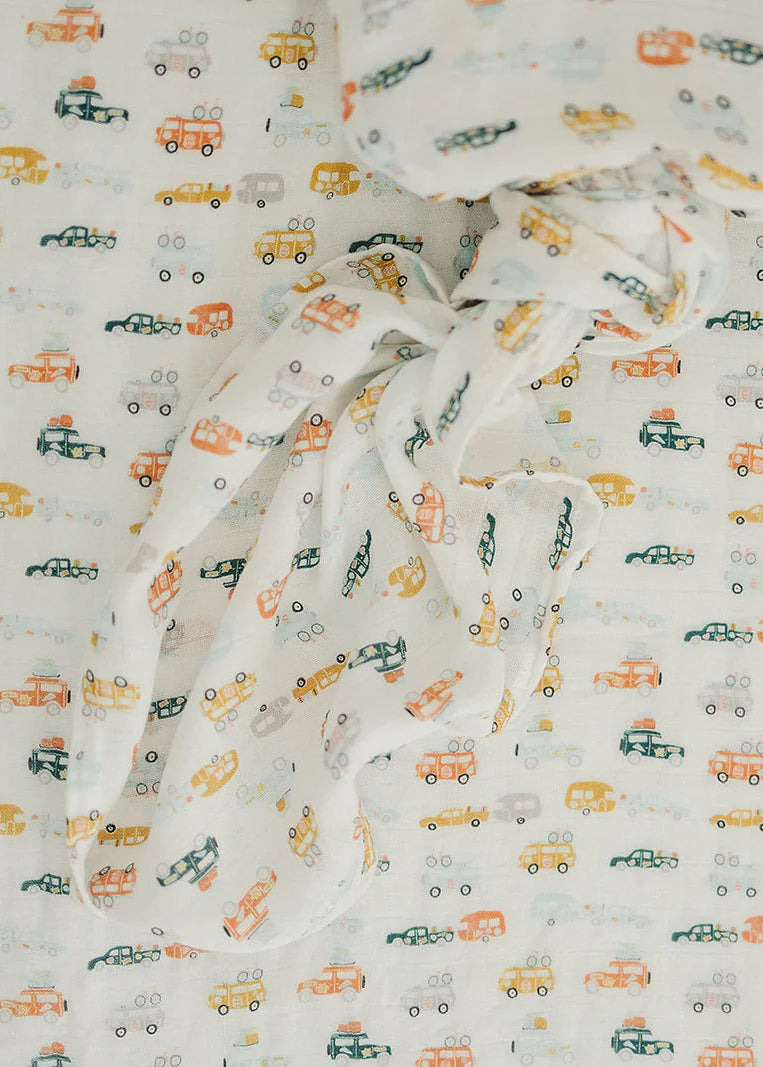 Baby blanket with car pattern on a white background
