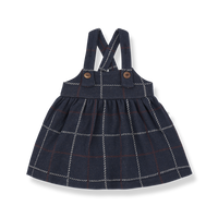 Navy checkered dress with suspenders on a white background