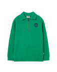 Green sweatshirt with a small logo on a light gray background