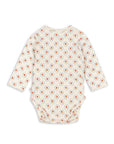 Baby bodysuit with floral pattern on a white background