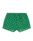 Green shorts with a small pattern on a white background