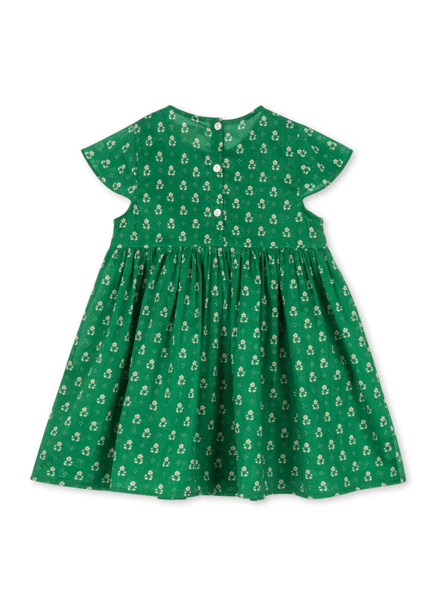 Green dress with floral pattern on a white background