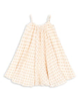 Yellow polka dot dress on a white background
