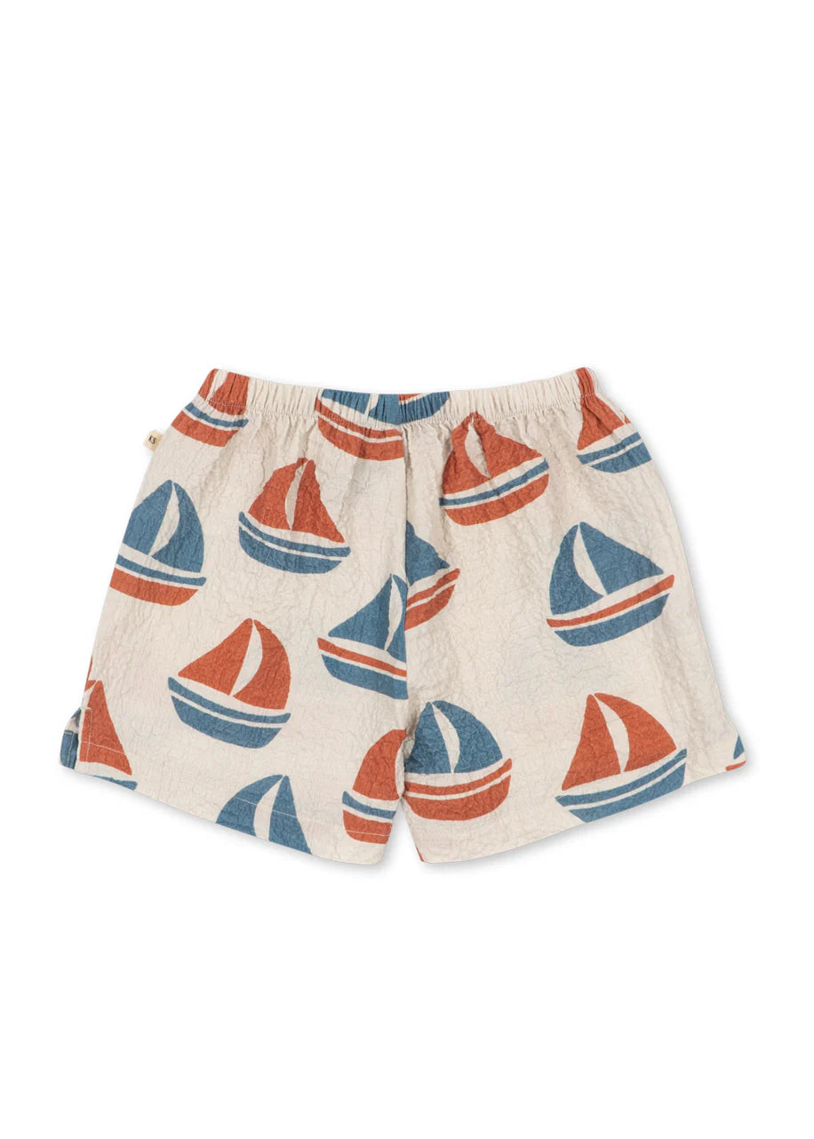 Shorts with sailboat pattern on a white background