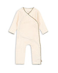 Beige baby romper on a white background