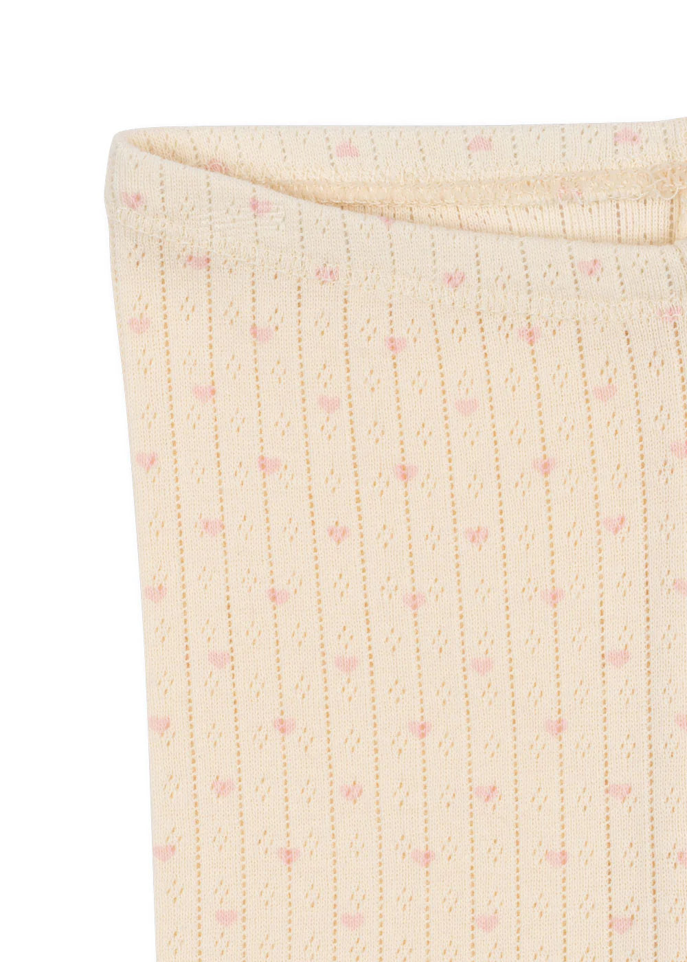 Close-up of a textured fabric with a subtle pattern on a white background