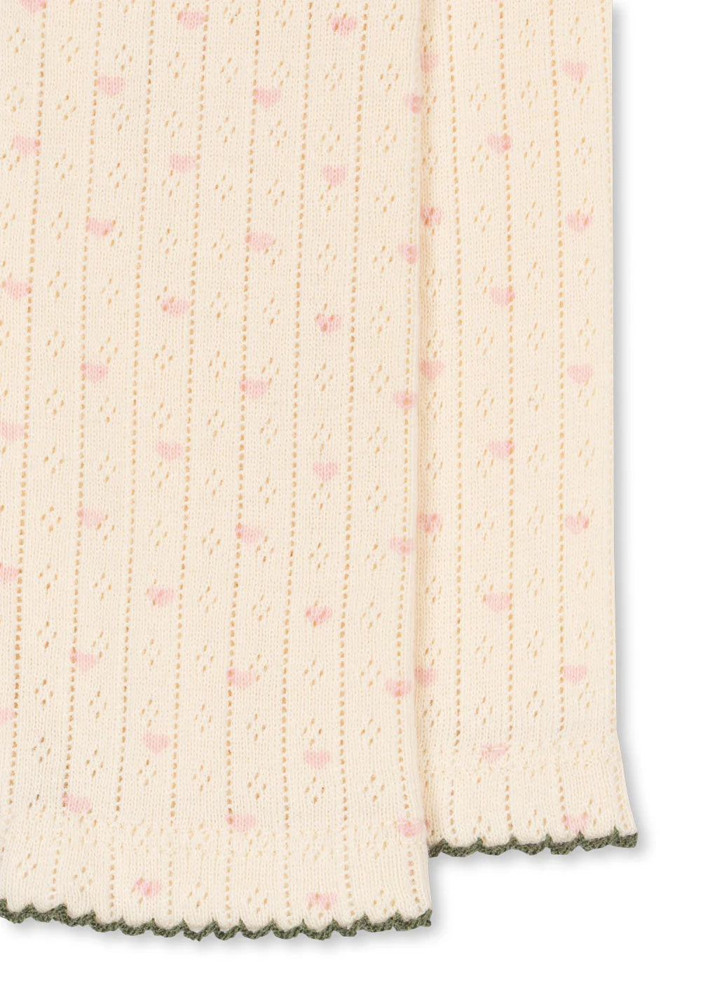 Close-up of a textured fabric with a subtle pattern on a white background